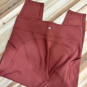 Lululemon Ankle Length leggings Size 14 Rust color w/ leg pockets